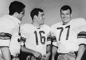 Stanford Prints: Bruin Football Players Talking Cheerfully
