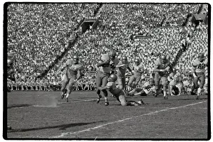 Tackling Prints: Bruin Tackling Syracuse Players