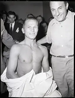 Dressing Room Prints: Bruised Tony Zale In Dressing Room