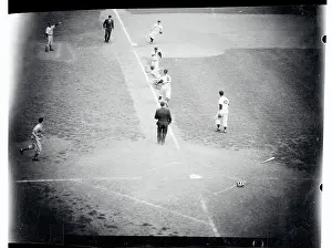 Bill Bruton Caught Between Third Base and Home Plate