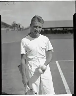 Bryan Bitsy Grant Holding Tennis Balls