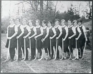 Prints of (Original Caption). Bryn Mawr's Speedy Hockey Team. In the above photo are shown the young ladies who wield speedy sticks on the hockey team of Bryn Mawr College, at Bryn Mawr, Pennsylvania Frozen Moments: A Journey Through Hockey History: Bryn Mawr Hockey Squad
