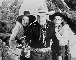 Buck Jones and Costars in Western Scene