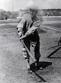 Buck Weaver Swinging Bat