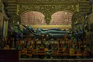 Buddha statue in Wat Xieng Thong, Buddhist temple in Luang Prabang World Heritage, Laos