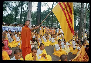 Buddhist Monk Holding a Flag