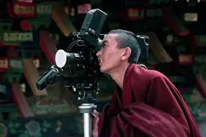 Buddhist Prints: Buddhist Monk Looking Through Camera