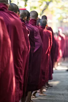 Myanmar Culture Gallery: Buddhist monks queuing for a meal, Bagan, Myanmar
