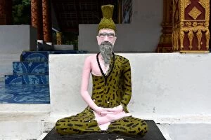 Leopard Gallery: buddhist statue at Wat Xangkhong temple luang prabang Laos Asia