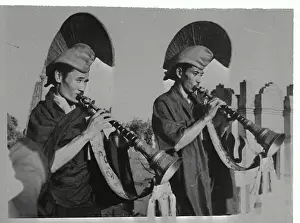 Buddhists Blowing Trumpets