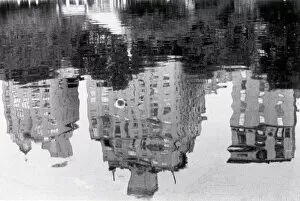 Calm Gallery: Buildings reflected in pool of water