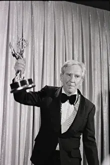 Emmy Award Ceremonies Prints: Burgess Meredith Cradles Emmy