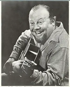 Burl Ives Playing the Guitar