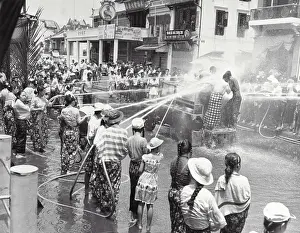 Burmese Carrying out Water Festival Ritual