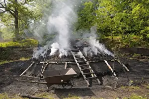 Pitcher Prints: Burning charcoal pile in the final stage