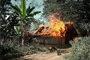 Vietcong Prints: Burning Huts in Viet Cong Stronghold