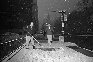 Burt Lancaster Jogging Down Fifth Avenue in Snow