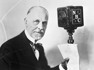 Intelligence Prints: Burton Holmes with Script in Hand by NBC Microphone