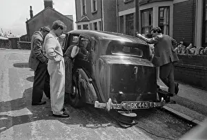 Prints of From left, a BBC interviewer, Welsh actor Richard Burton and Burton's first wife, Sybil, gathered round a car during a visit by Burton to his birthplace, the village of Pontrhydyfen in south Wales Moments of Everyday Brilliance: Burton Returns To Pontrhydyfen