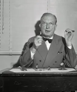 Wheeler Prints: Burton Wheeler Inspecting Lead Soldier Toy