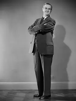 Business man with arms crossed, portrait