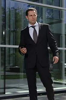 Portability Collection: Business man outside a bank