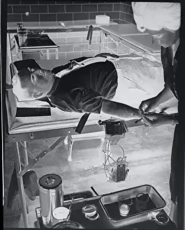 Tubing Prints: Businessman Preparing to Give Blood