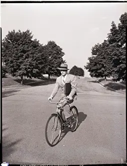 Suburb Prints: Businessman Riding a Bicycle