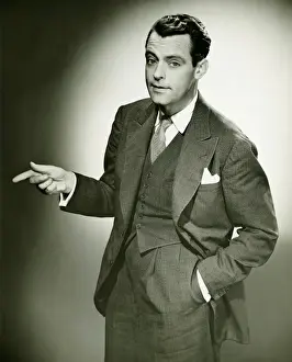 Finger Prints: Businessman standing, gesturing (B&W)
