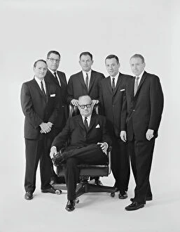 Images Dated 20th July 2011: Businessmen against white background, portrait