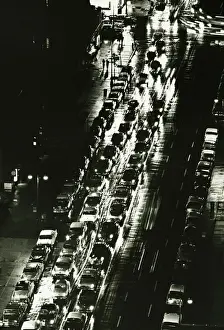 Sidewalk Prints: Busy city street at night, (B&W), (Aerial view)