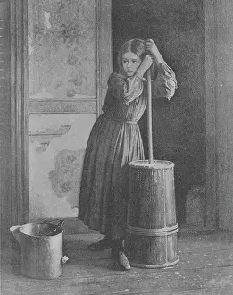 Prints of Engraving depicting a young girl churning butter in a run-down house, 1910. (Photo by (F. Lewis/Archive Photos/Getty Images) Urban Echoes of America’s Golden Age: Butter Churner