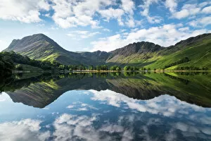 Images Dated 6th August 2016: Buttermere lake early morning reflections. A beautiful summer morning with Fleetwith Pike