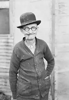Sweater Prints: C. A. Morris Wearing Derby