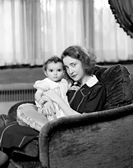 Cab Calloway's Child On A Woman's Lap