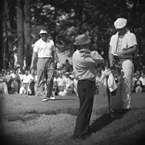 Caddy Watching Sam Snead Drop Ball over Shoulder