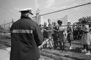 Threatening Prints: Caged Protesters