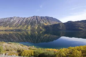 Calm windy arm of Tagish Lake, reflections, Escarment Mountain, Tagish Highland behind, autumn, Indian Summer