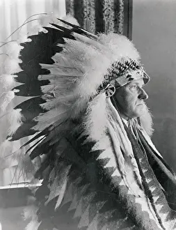 Calvin Coolidge Wearing Sioux Head Dress