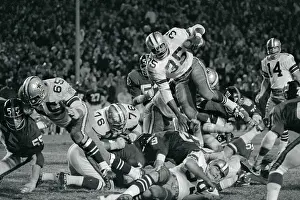 Calvin Hill Jumping Over Line
