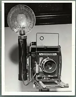 Camera with Flash Attached