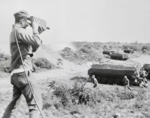Cameraman Filming Mock Battle