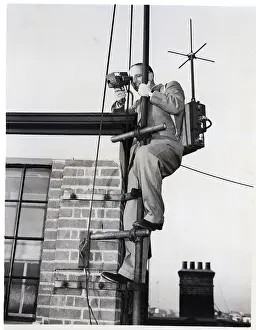 Flagpole Prints: Cameraman on Flagpole with Portable Television Camera