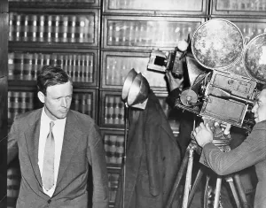 Filming Prints: Cameramen Filming Charles Lindbergh Entering Court