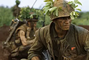 Squatting Prints: Camouflaged Marines on Reconnaissance in Vietnam