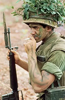 Camouflaged Soldier Smoking Cigarette Print, Vietnam 1968. Art Prints,  Posters & Puzzles from Fine Art Storehouse