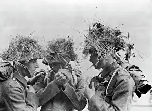 Camouflaged Soldiers Taking a Break