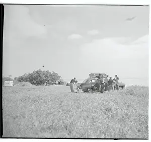Campers Unloading Their Car