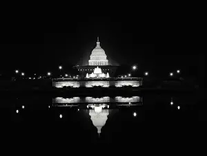 Evening Prints: US Capitol building at night with a reflection in Tidal Basin at Washington DC
