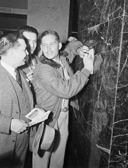 Autographing Prints: Captain Kermit K. Beahan Signing Autographs